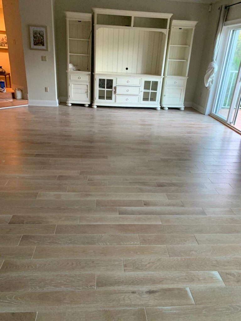 Stunning Sarasota wood flooring installation showcased in a modern living room.